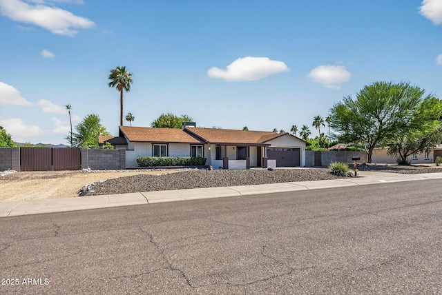 5101 E Paradise Dr, Scottsdale, AZ 85254 - ranch-style home with a garage, driveway, and a gate