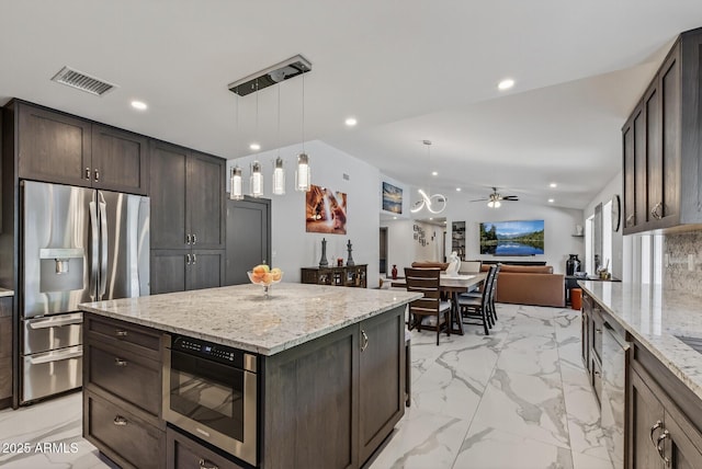 5101 E Paradise Dr, Scottsdale, AZ 85254 - kitchen with stainless steel fridge, light marble finish flooring, dark brown cabinets, open floor plan, and ceiling fan