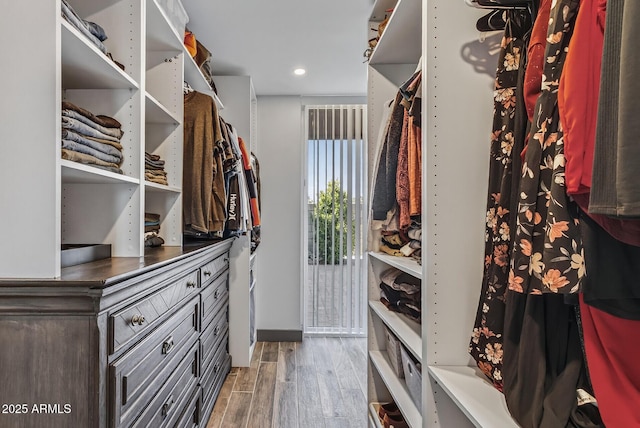 5101 E Paradise Dr, Scottsdale, AZ 85254 - walk in closet featuring wood finished floors