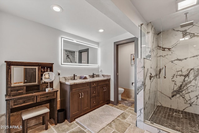 5101 E Paradise Dr, Scottsdale, AZ 85254 - full bathroom with a marble finish shower, double vanity, recessed lighting, and stone finish flooring