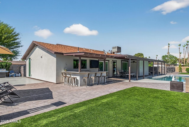 5101 E Paradise Dr, Scottsdale, AZ 85254 - back of house with stucco siding and a patio area
