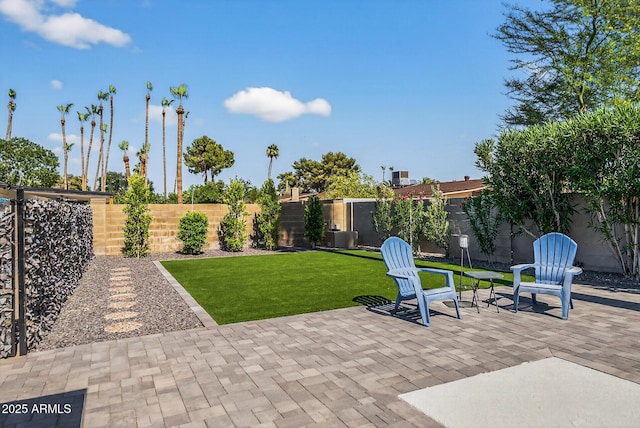 5101 E Paradise Dr, Scottsdale, AZ 85254 - fenced backyard featuring a patio area