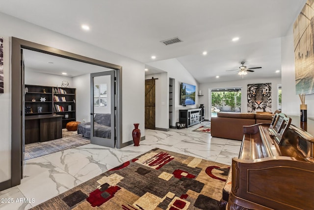 5101 E Paradise Dr, Scottsdale, AZ 85254 - living area featuring light marble finish flooring, recessed lighting, a ceiling fan, lofted ceiling, and a barn door