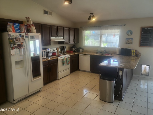 kitchen featuring light tile patterned flooring, white appliances, a peninsula, lofted ceiling, and under cabinet range hood