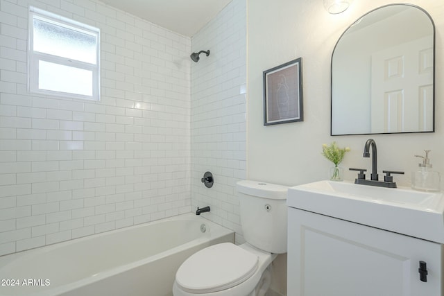 full bathroom featuring vanity, toilet, and tiled shower / bath combo