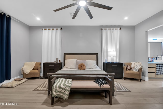 bedroom with light wood-style floors, recessed lighting, baseboards, and a ceiling fan