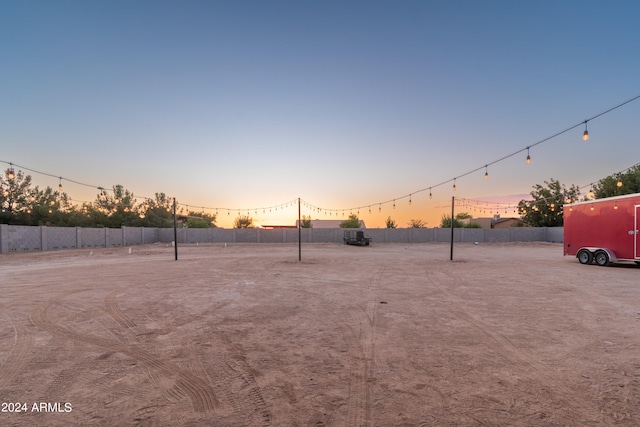 yard at dusk with fence