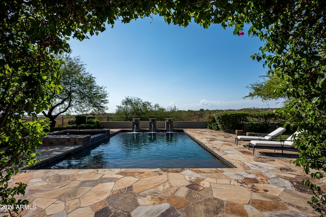 view of pool featuring a patio and pool water feature