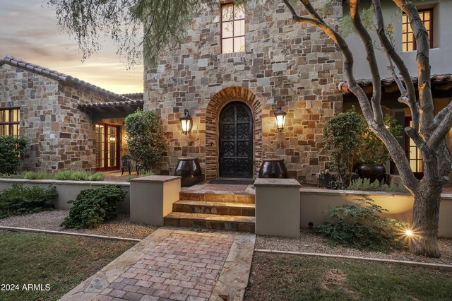 view of pool with pool water feature and a patio