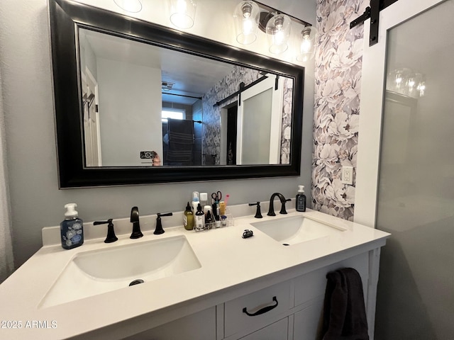 full bath with double vanity and a sink