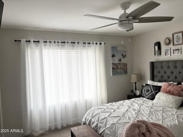 bedroom featuring carpet floors and ceiling fan