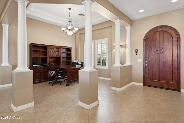 tiled office space featuring a chandelier