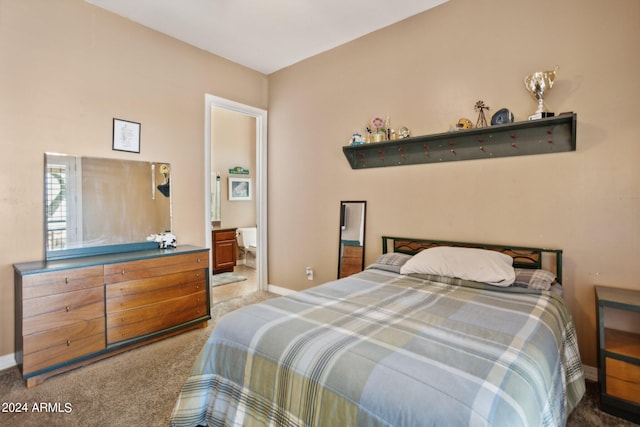 carpeted bedroom with ensuite bath