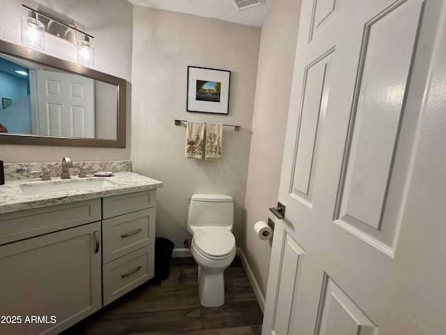 1060 E Louis Way, Tempe, AZ 85284 - bathroom featuring wood finished floors and vanity