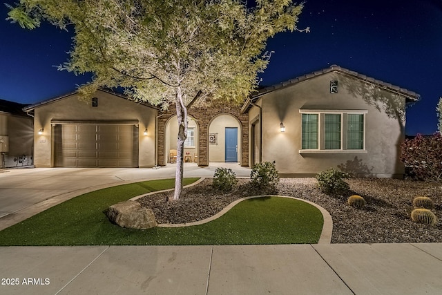 view of front of property featuring a garage