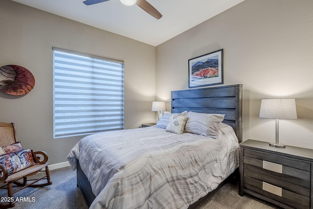 carpeted bedroom with multiple windows and ceiling fan