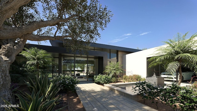 rear view of house featuring a patio area