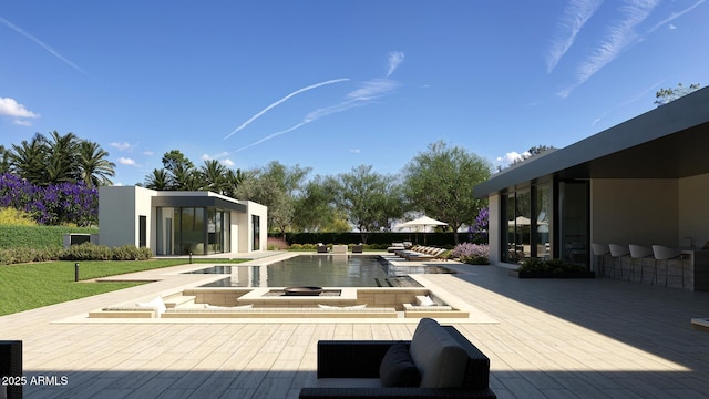 view of swimming pool with a patio area