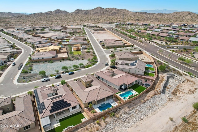 drone / aerial view featuring a mountain view