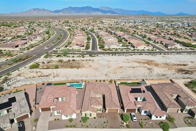 drone / aerial view with a residential view and a mountain view