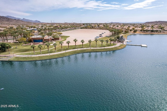 bird's eye view with a water and mountain view