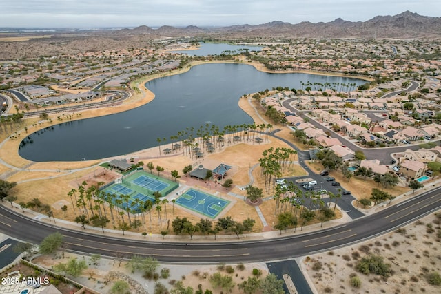 bird's eye view featuring a water and mountain view