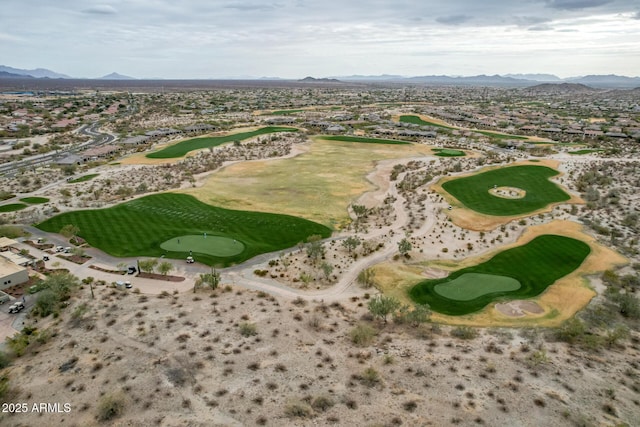 bird's eye view with a mountain view and golf course view