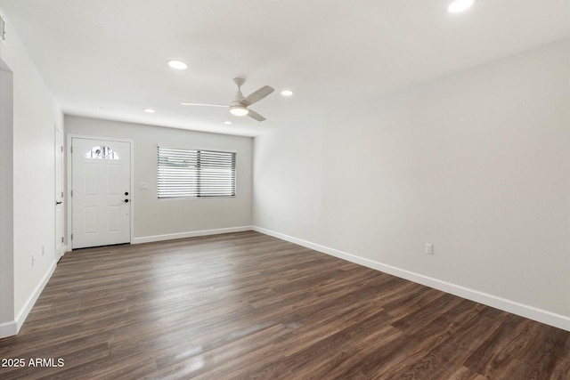 entryway featuring dark wood-type flooring, recessed lighting, and baseboards