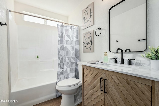 full bathroom featuring vanity, hardwood / wood-style flooring, shower / bathtub combination with curtain, and toilet