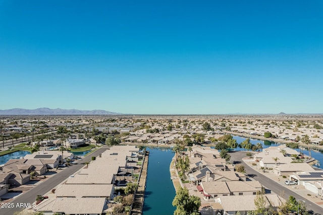 bird's eye view featuring a water and mountain view