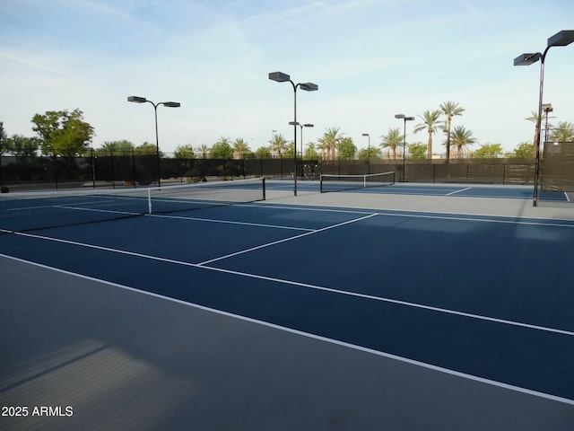 view of tennis court with basketball court