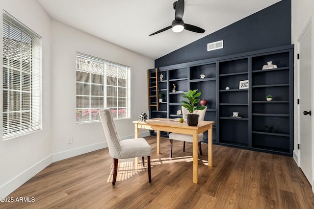 office area with ceiling fan, plenty of natural light, vaulted ceiling, and hardwood / wood-style flooring