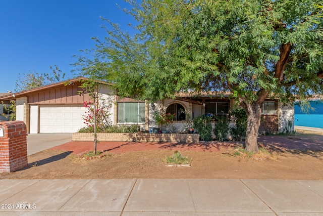 view of front of property featuring a garage