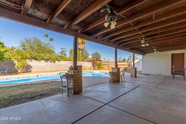 view of patio featuring a fenced in pool