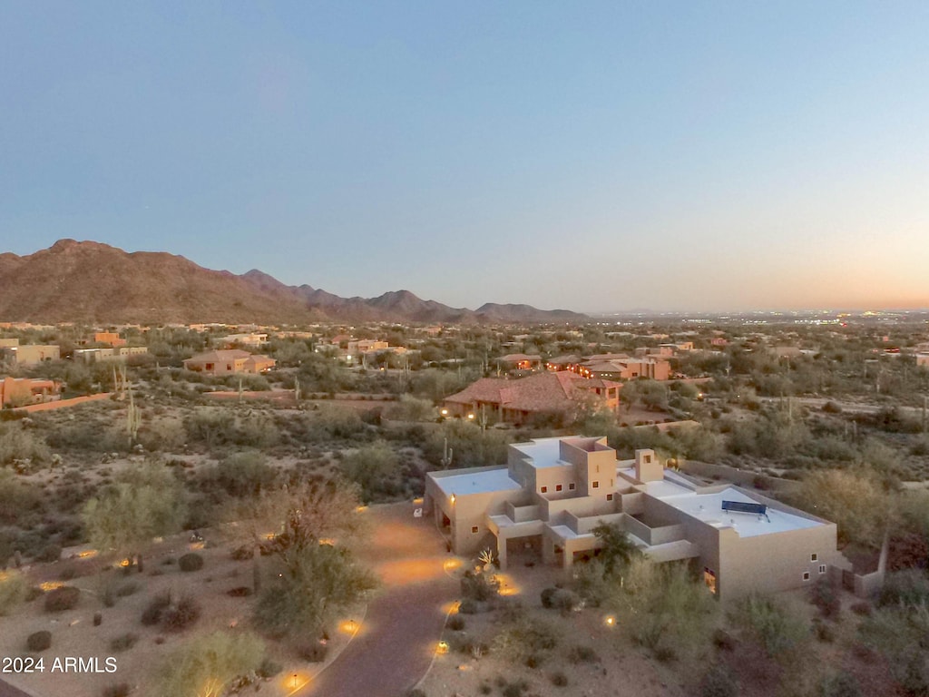 aerial view at dusk with a mountain view