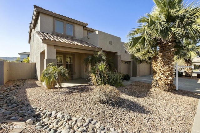 view of front of home with a garage