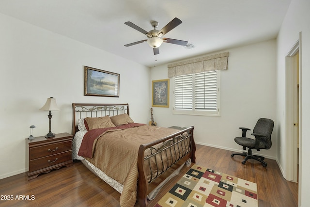 bedroom featuring ceiling fan and dark hardwood / wood-style flooring