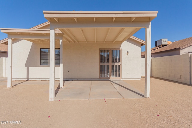 rear view of property with a patio area