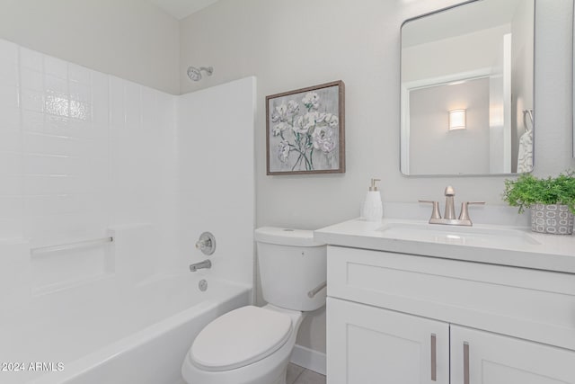 full bathroom featuring vanity, bathing tub / shower combination, and toilet