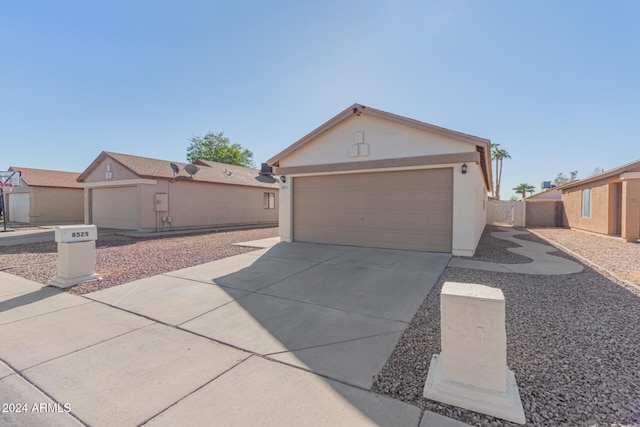 view of front of property featuring a garage