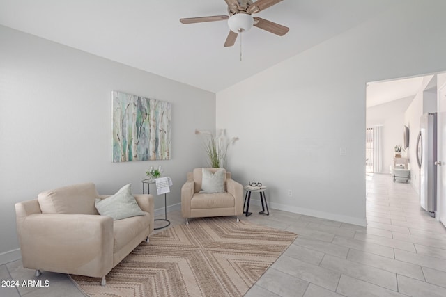 sitting room featuring ceiling fan and lofted ceiling