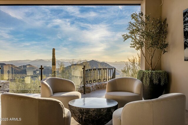 balcony featuring a mountain view