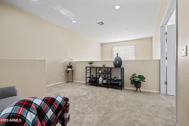 living area with recessed lighting, visible vents, baseboards, and carpet flooring