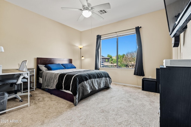 bedroom with visible vents, a ceiling fan, baseboards, and carpet floors