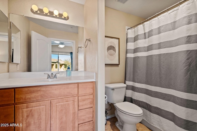 bathroom featuring tile patterned floors, visible vents, toilet, a shower with shower curtain, and vanity