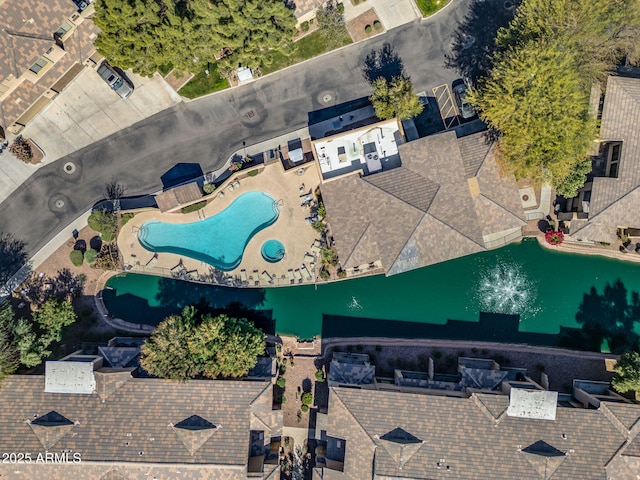 drone / aerial view with a water view