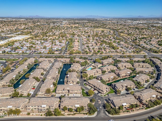 aerial view featuring a residential view and a water view