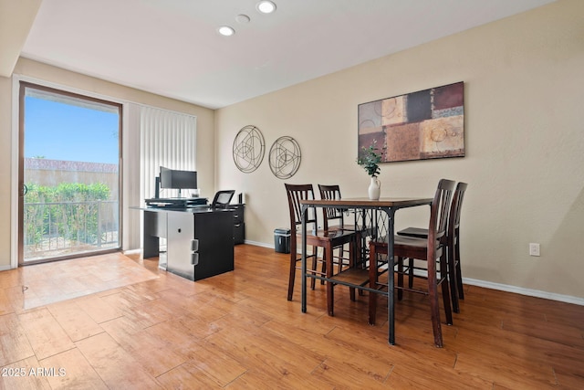 dining space featuring light wood-style flooring, recessed lighting, and baseboards