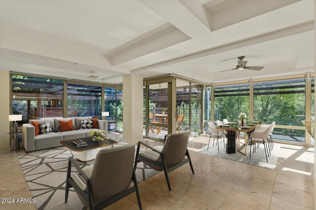 sunroom / solarium with ceiling fan