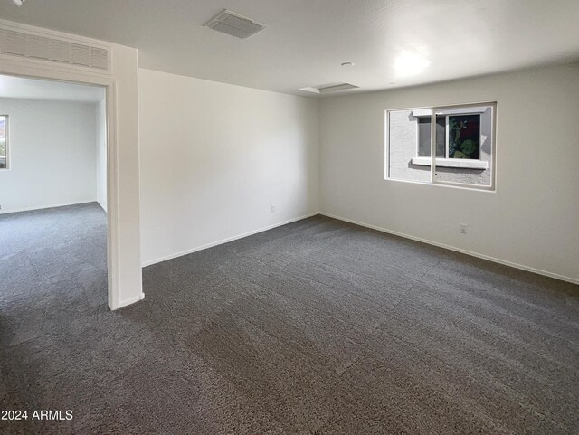 empty room featuring carpet